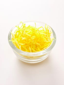close up of a bowl of lemon zest