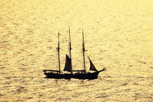 boat on the sea with sunset light