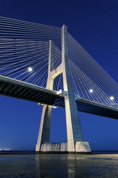 vertical view of Vasco da Gama bridge by night, Lisbon