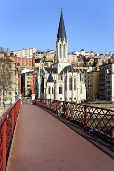 view of Lyon with red footbridge on Saone river