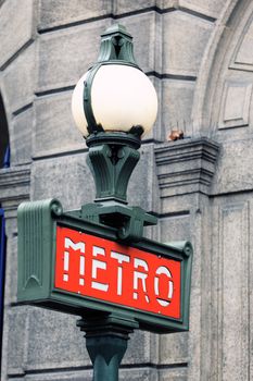 Red and green metro sign in Paris France 