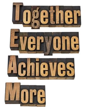 TEAM - together everyone achieves more - teamwork and cooperation concept - a collage of isolated words in vintage letterpress printing blocks