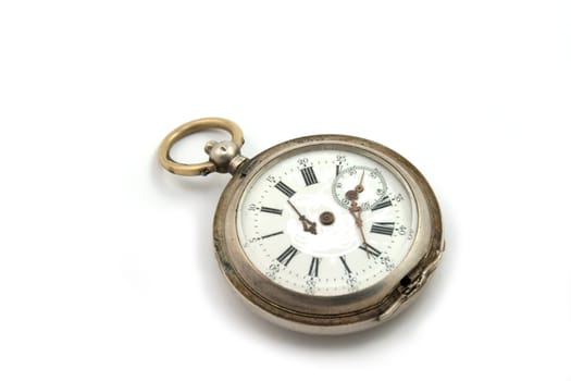 Old broken clock on a white background