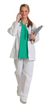 Image of a young female doctor on the phone holding a clipboard and walking to the camera, isolated against a white background.