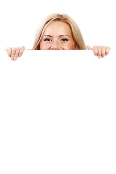 business woman hidden behind a white sheet of paper