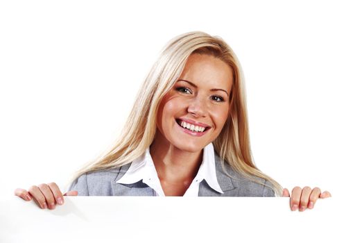 business woman hidden behind a white sheet of paper