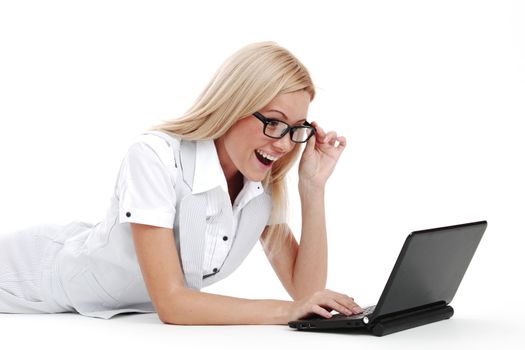 business woman lies and working on laptop