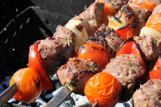 Kebabs, threaded on a skewer and grill.