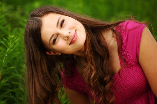 woman in grass close up