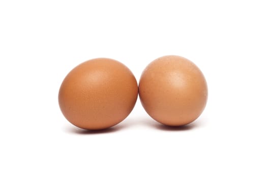 two eggs are isolated on a white background