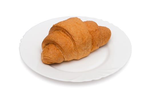 Fresh and tasty croissant over white background