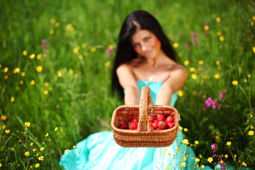 sweet strawberry in woman hands