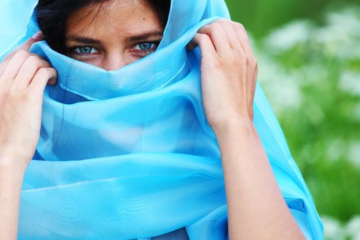 woman portrait in blue fabric