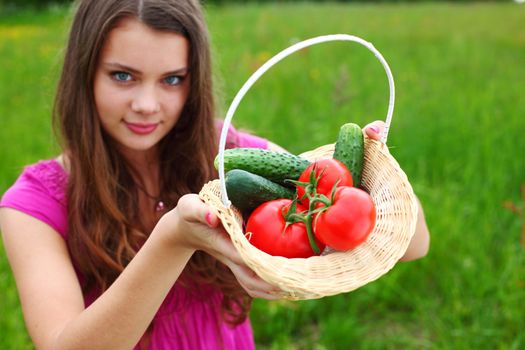 woman give vegetables to you