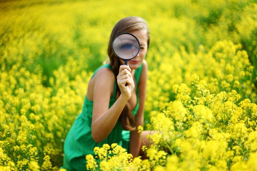 botanist woman in yellow flower field