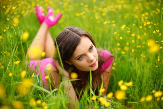 woman on flower field close portrait