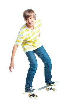 cute teenger blond boy on standing on skateboard isolated on white background