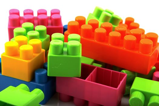 Plastic building blocks on a white background