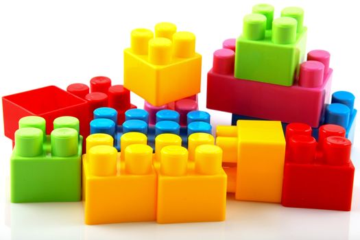 Plastic building blocks on a white background