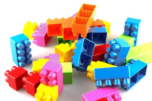 Plastic building blocks on a white background