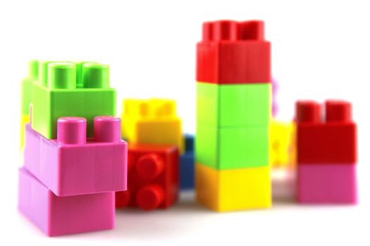 Plastic building blocks on a white background