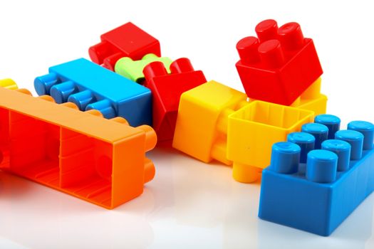 Plastic building blocks on a white background