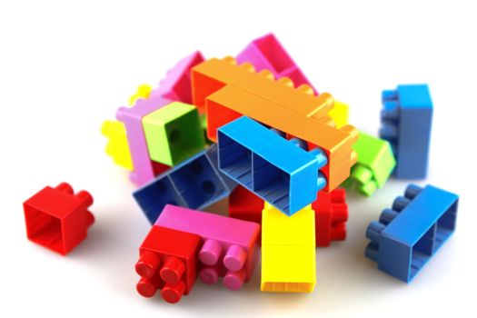 Plastic building blocks on a white background