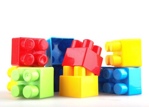 Plastic building blocks on a white background