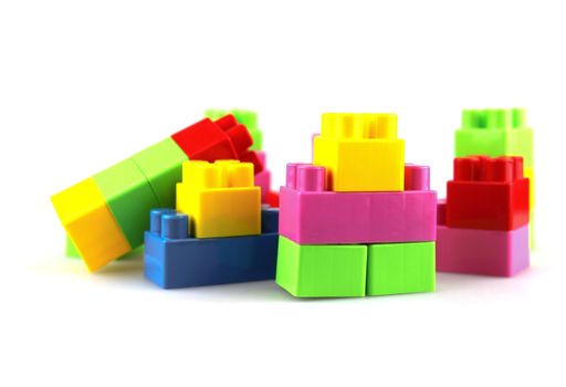 Plastic building blocks on a white background