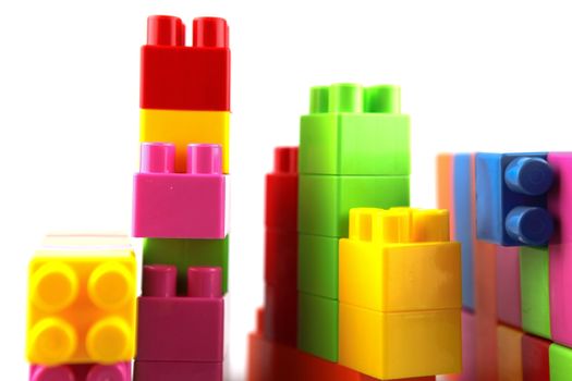 Plastic building blocks on a white background