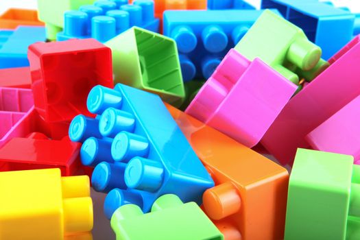 Plastic building blocks on a white background