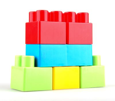 Plastic building blocks on a white background