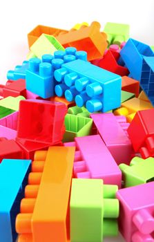 Plastic building blocks on a white background