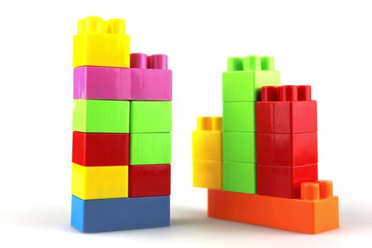 Plastic building blocks on a white background