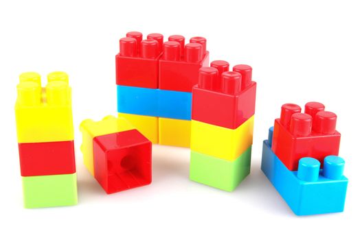 Plastic building blocks on a white background