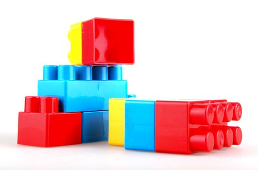 Plastic building blocks on a white background