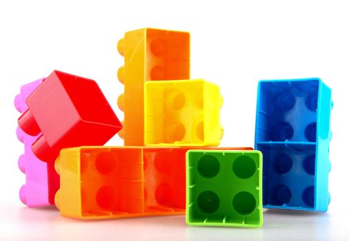 Plastic building blocks on a white background