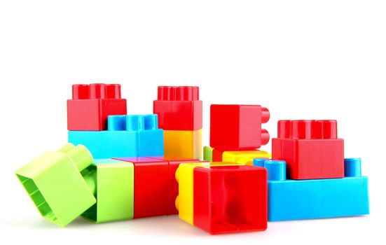 Plastic building blocks on a white background