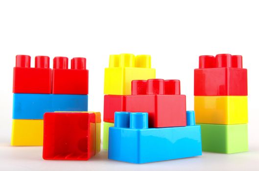 Plastic building blocks on a white background