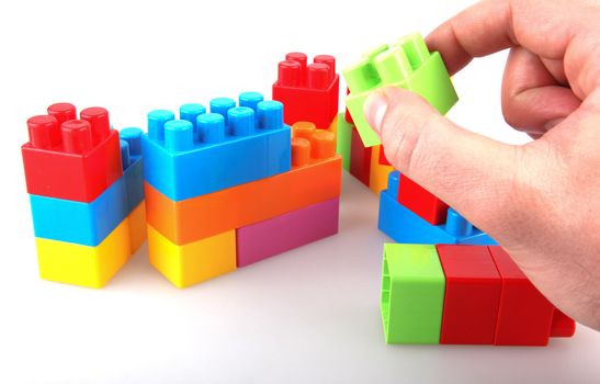 Plastic building blocks on a white background