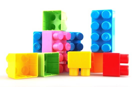 Plastic building blocks on a white background