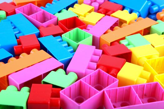 Plastic building blocks on a white background