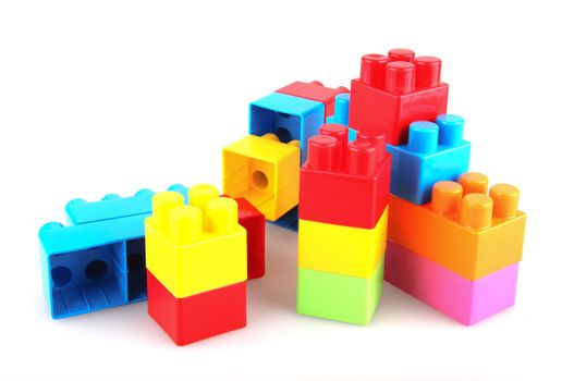 Plastic building blocks on a white background