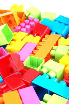 Plastic building blocks on a white background