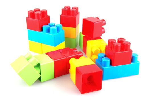 Plastic building blocks on a white background