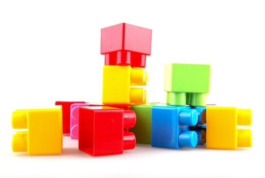 Plastic building blocks on a white background