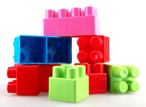 Plastic building blocks on a white background