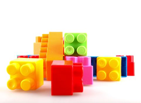 Plastic building blocks on a white background