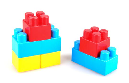 Plastic building blocks on a white background
