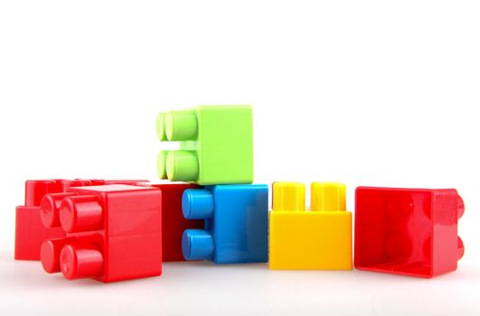 Plastic building blocks on a white background